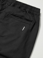Folk - Assembly Tapered Pleated Stretch Organic Cotton-Ripstop Trousers - Black
