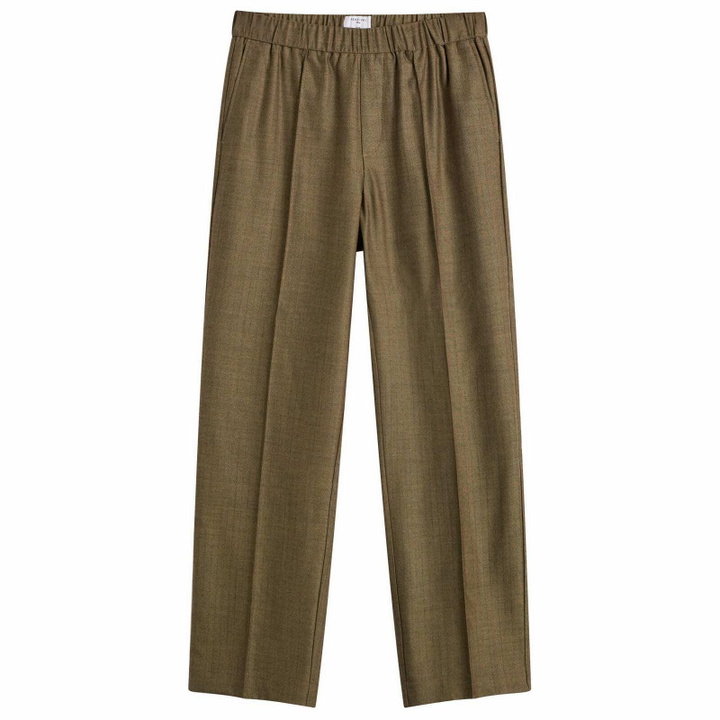Photo: Percival Men's Grounds Herringbone Wool Relaxed Trousers in Oak
