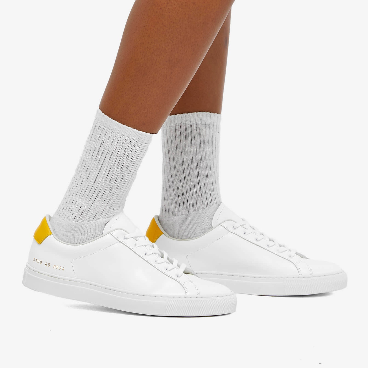 Woman by Common Projects Women's Retro Low Sneakers in White