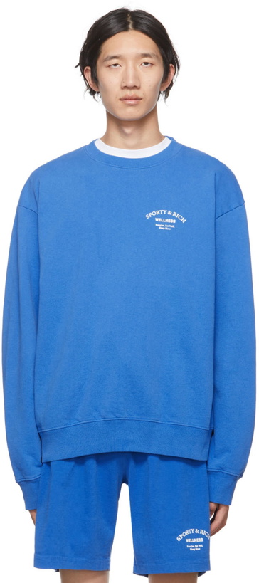 Photo: Sporty & Rich Blue Wellness Studio Sweatshirt