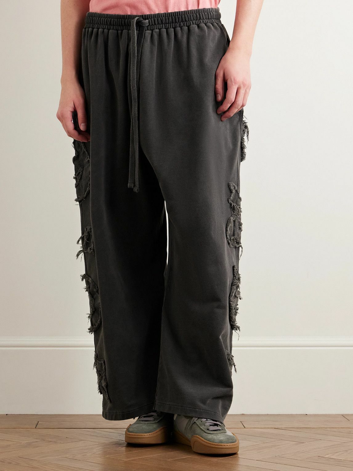 Acne Studios - Prowser Wide-Leg Distressed Appliquéd Cotton-Jersey Sweatpants - Black
