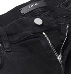 AMIRI - Skinny-Fit Appliquéd Distressed Stretch-Denim Jeans - Men - Black