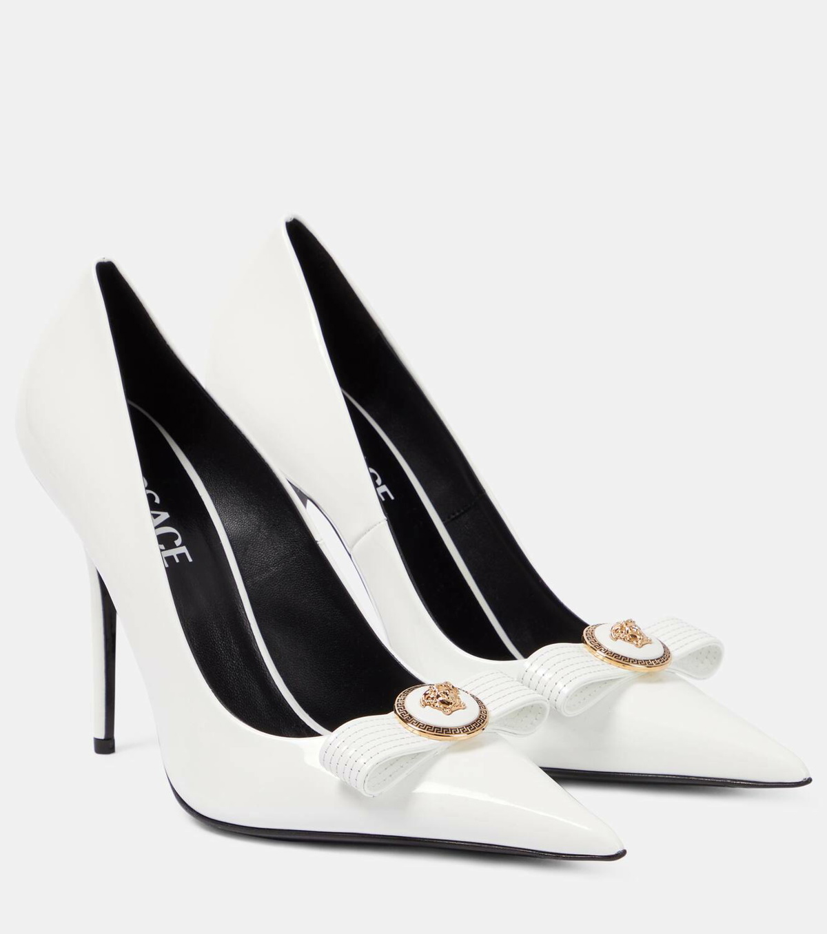 Gianni bow-detail satin pumps in pink - Versace