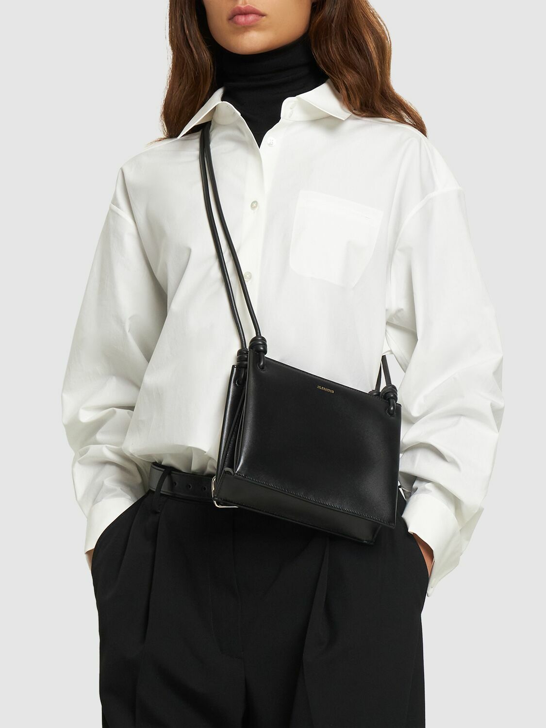 Giro Small leather crossbody bag in black - Jil Sander