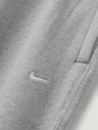 Nike - Solo Swoosh Tapered Logo-Embroidered Cotton-Blend Jersey Sweatpants - Gray