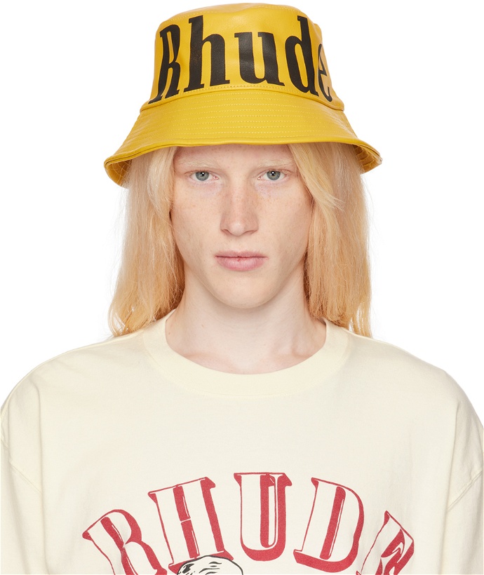 Photo: Rhude Yellow Logo Leather Bucket Hat