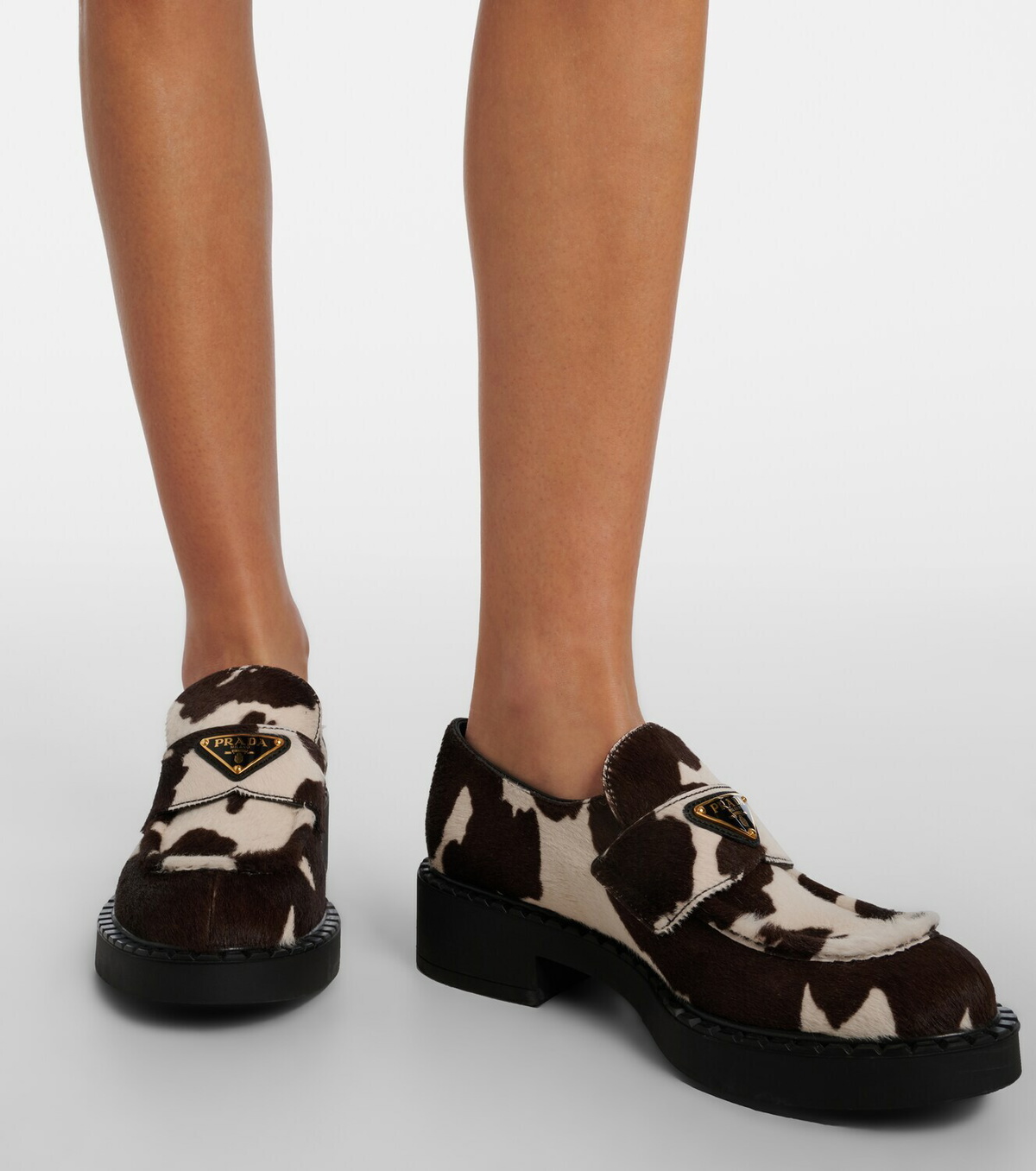 Prada Chocolate cow-print calf hair loafers