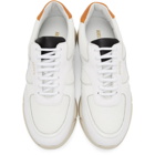 Axel Arigato White and Orange Genesis Triple Sneakers