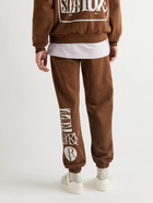 Total Luxury Spa - Tapered Printed Cotton-Jersey Sweatpants - Brown