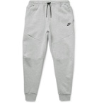 Nike - Sportswear Tapered Logo-Print Mélange Cotton-Blend Tech-Fleece Sweatpants - Gray