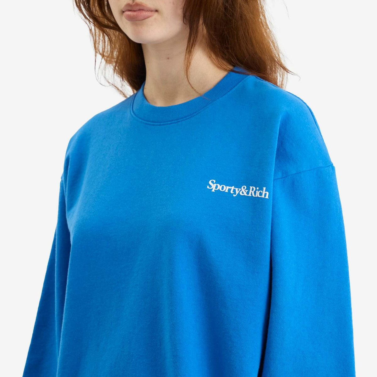 Sporty & Rich Women's Health is Wealth Crew Sweatshirt in Paris Blue
