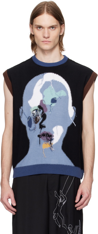Photo: KidSuper Black Reverse Knit Patchwork Face Sweater