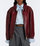 Prada Distressed houndstooth leather jacket