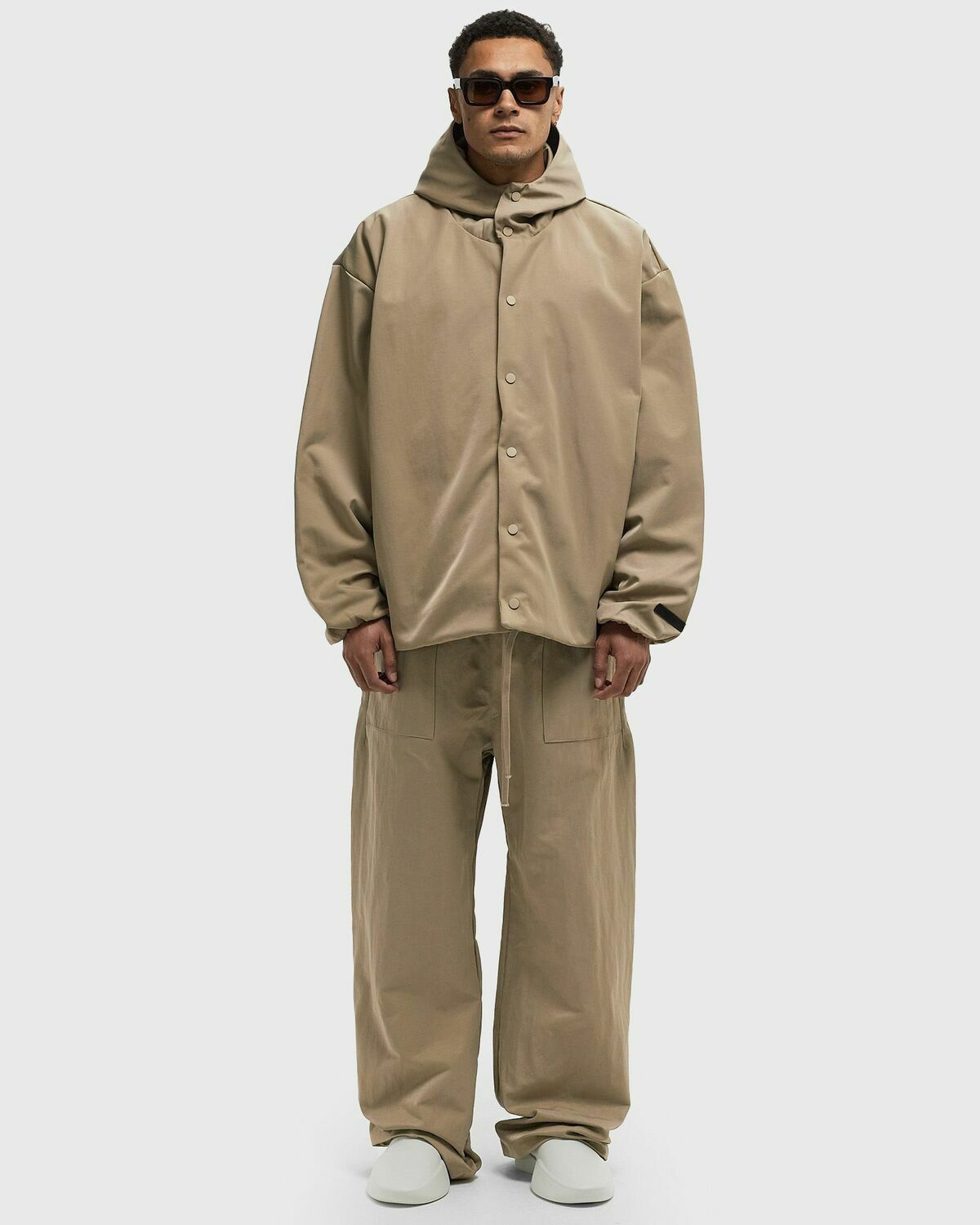 Fear of God Essentials TEXTURED NYLON HOODED COACHES JACKET