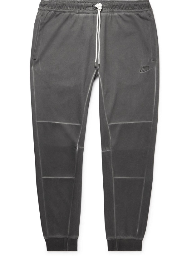Photo: Nike - Tapered Logo-Embroidered Panelled Recycled Jersey Sweatpants - Gray