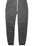 Nike - Tapered Logo-Embroidered Panelled Recycled Jersey Sweatpants - Gray