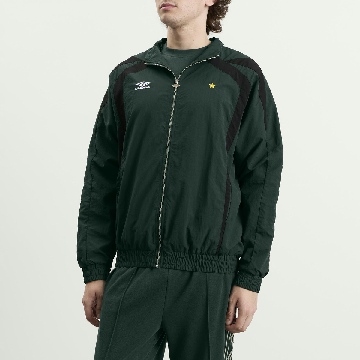 Umbro Men's Relaxed Track Jacket in Pine Grove/Black