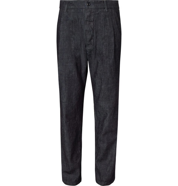 Photo: Arpenteur - Tapered Pleated Denim Trousers - Men - Indigo