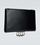 McQueen Four-Ring embellished leather clutch