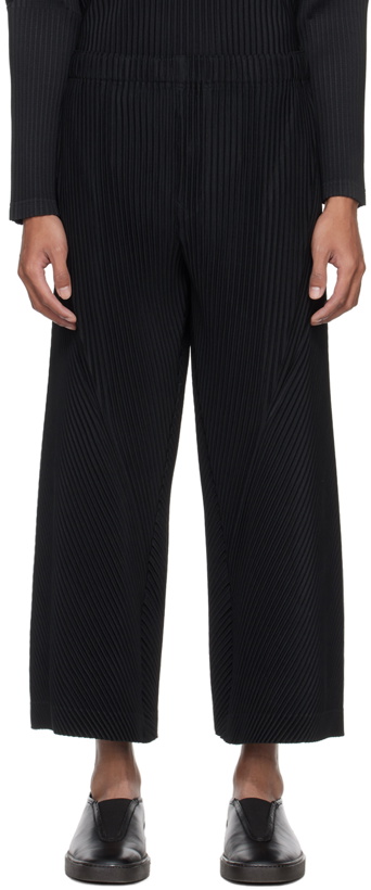 Photo: HOMME PLISSÉ ISSEY MIYAKE Black Pleats Trousers