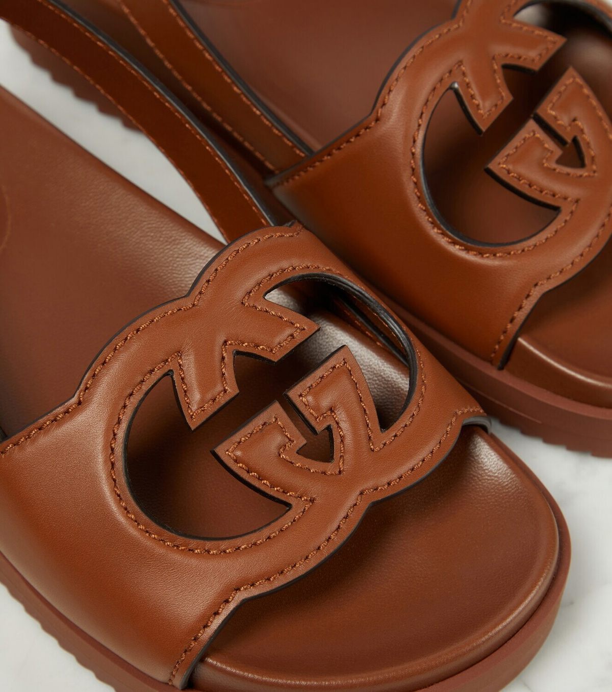 Interlocking G leather slides