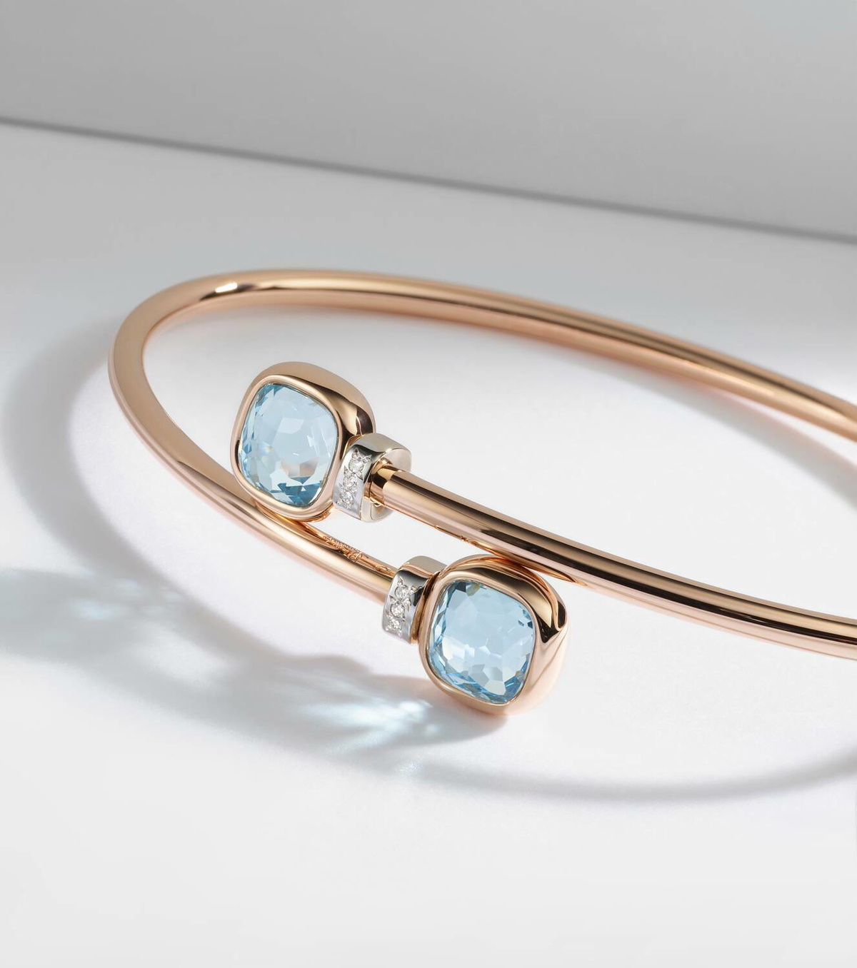 Pomellato Nudo 18kt white gold bangle with diamonds and topaz