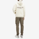 Represent Men's Team 247 Oversized Hoodie in Cream
