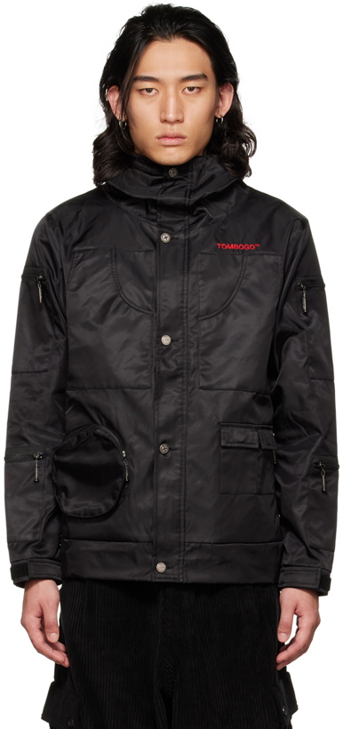 Photo: TOMBOGO™ Black Hardware Rain Jacket