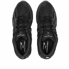Comme Des Garçons Homme Men's x New Balance 1906 Sneakers in Black