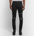 AMIRI - Skinny-Fit Embellished Twill-Panelled Distressed Stretch-Denim Jeans - Black